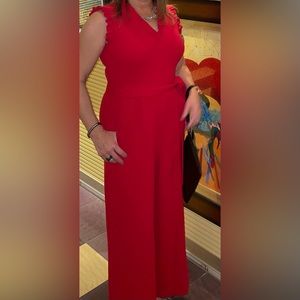 Red jumpsuit worn once! Needs to go to a good home.